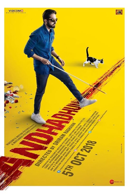 Bearded man with cane and cat.