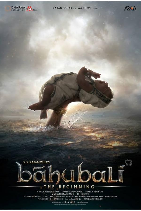 Baby lifted above stormy ocean, Bahubali