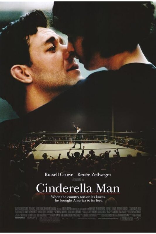 Two men nearly kissing above boxing ring.