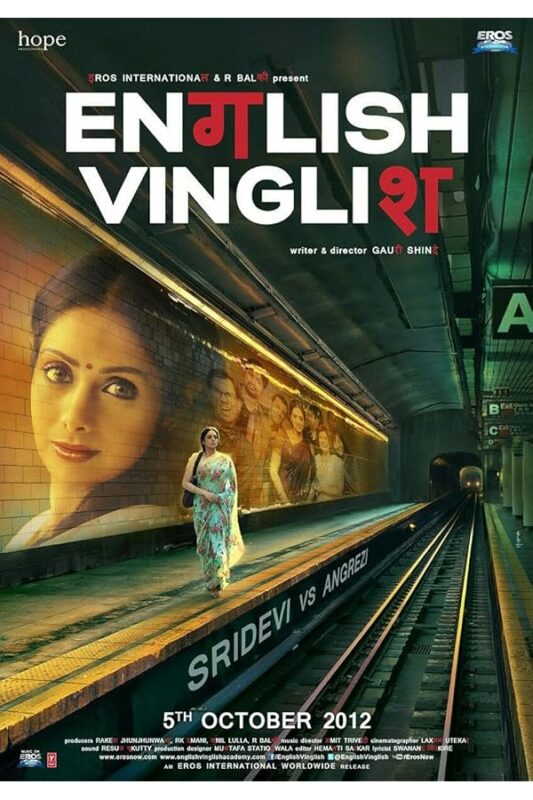 Woman in saree walking on subway platform