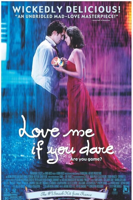 Couple touching foreheads in rain.