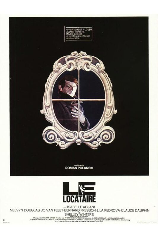 Man peering through ornate oval mirror