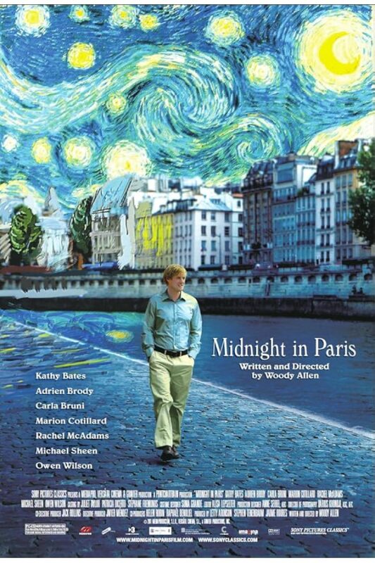 Man walking Paris quay under starry sky