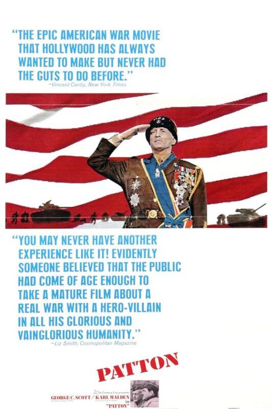 Saluting decorated general before waving flag