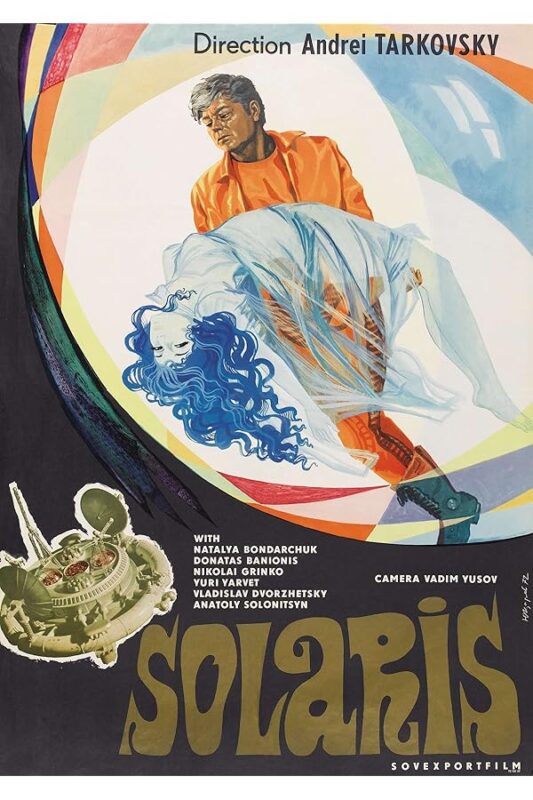 Man in orange holding translucent blue-haired woman